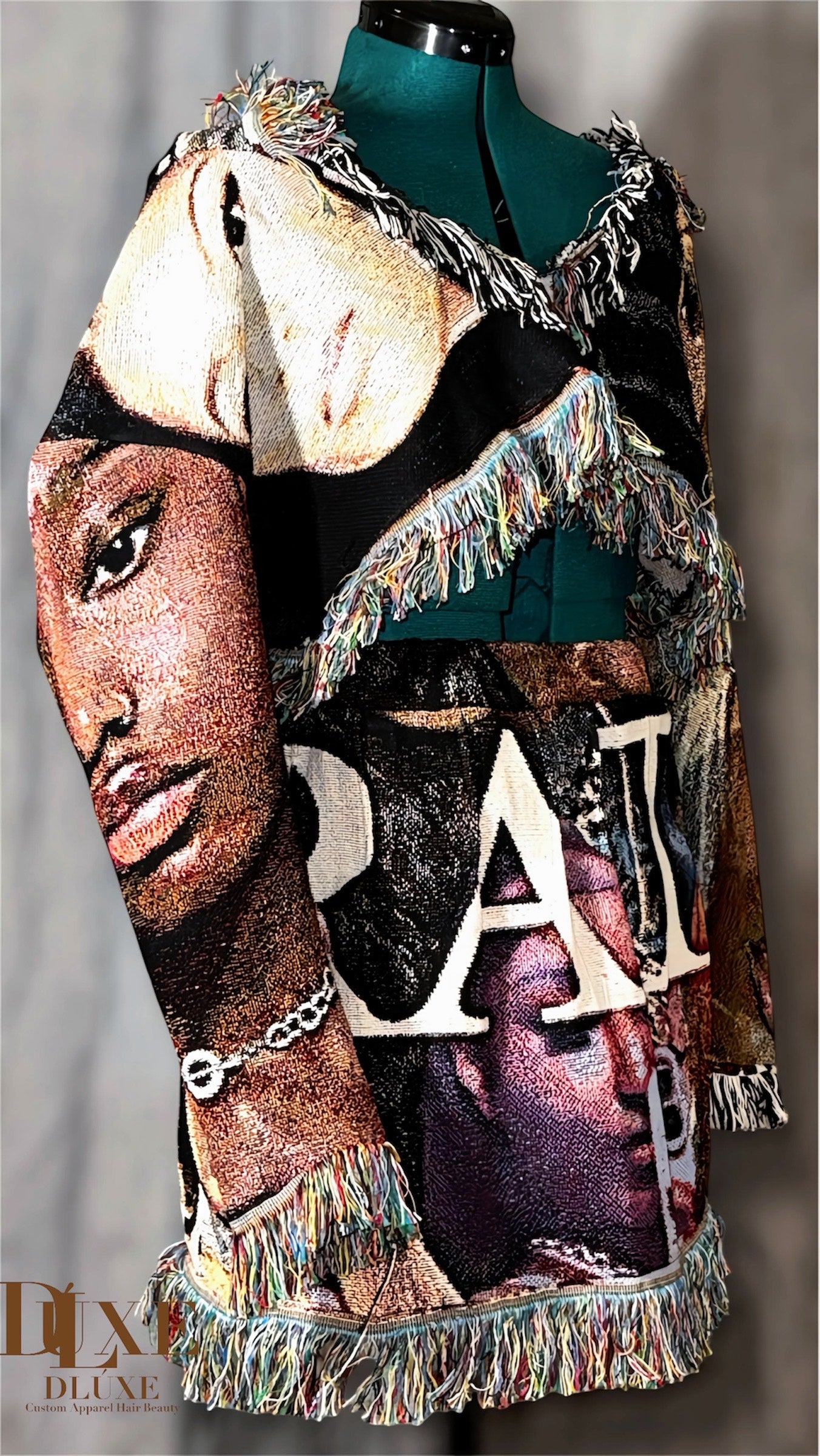 Mannequin wearing a colorful tapestry set with a custom print and fringe details.