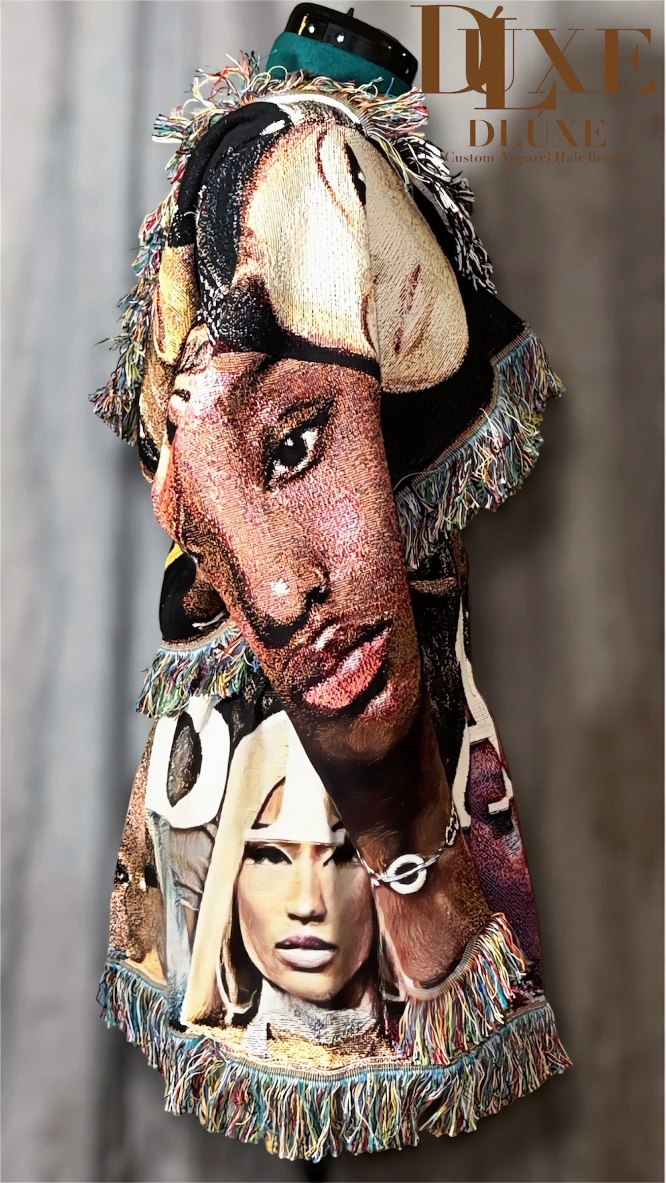 Decorative tapestry art with portrait sof a client, featuring the brand 'DLUXE'